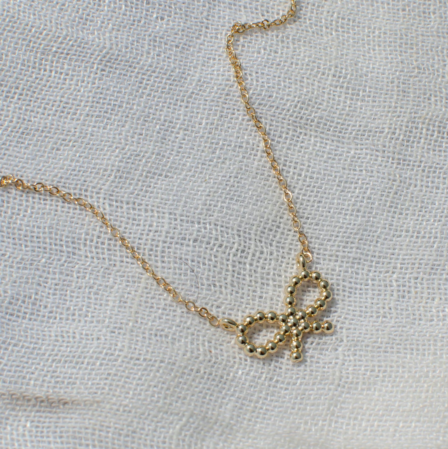 Dainty Beaded Bow Necklace